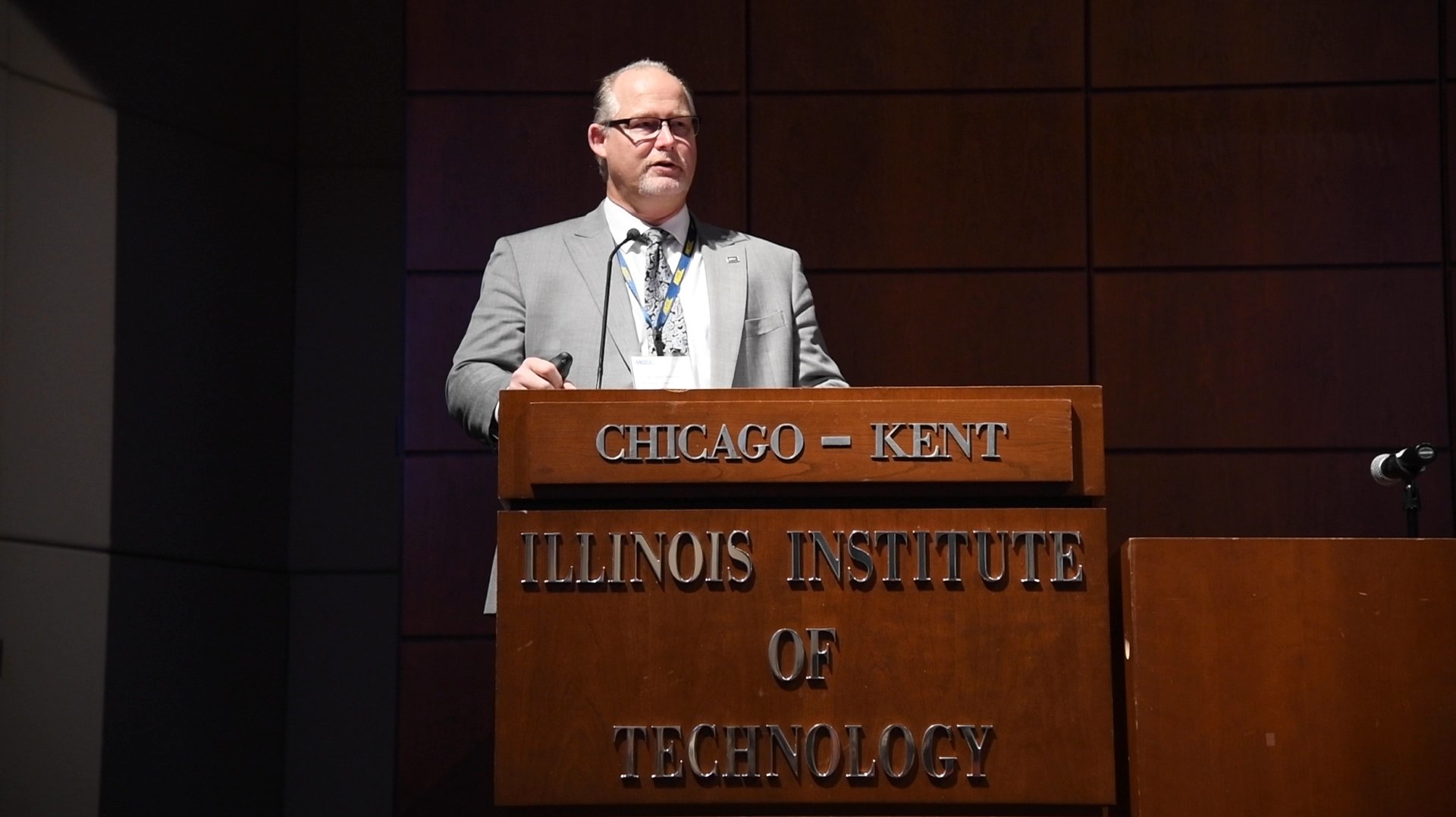 Metra Chief Safety and Environmental Officer Hilary Konczal addresses attendees at Metra's 'Breaking the Silence' event where the FRA spoke as well.