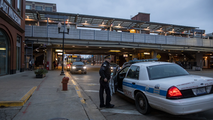 A Chicago police officer leaves the scene after responding to a person being stabbed at the Fullerton stop during the Friday morning rush hour in the Lincoln Park neighborhood on Dec. 6, 2019. All northbound Red Line trains were stopped.