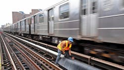MTA New York City Transit crew performs a track inspection on the elevated Broadway 1 line near 125 St.