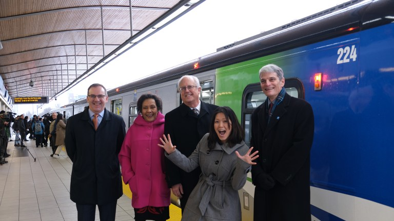 Officials celebrate the new trains beginning service on the Canada Line.