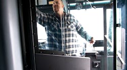 The safety shield has a sliding glass window, allowing for easier communication with passengers. The safety shield has a sliding glass window, allowing for easier communication with passengers.