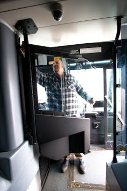 The safety shield has a sliding glass window, allowing for easier communication with passengers. The safety shield has a sliding glass window, allowing for easier communication with passengers.