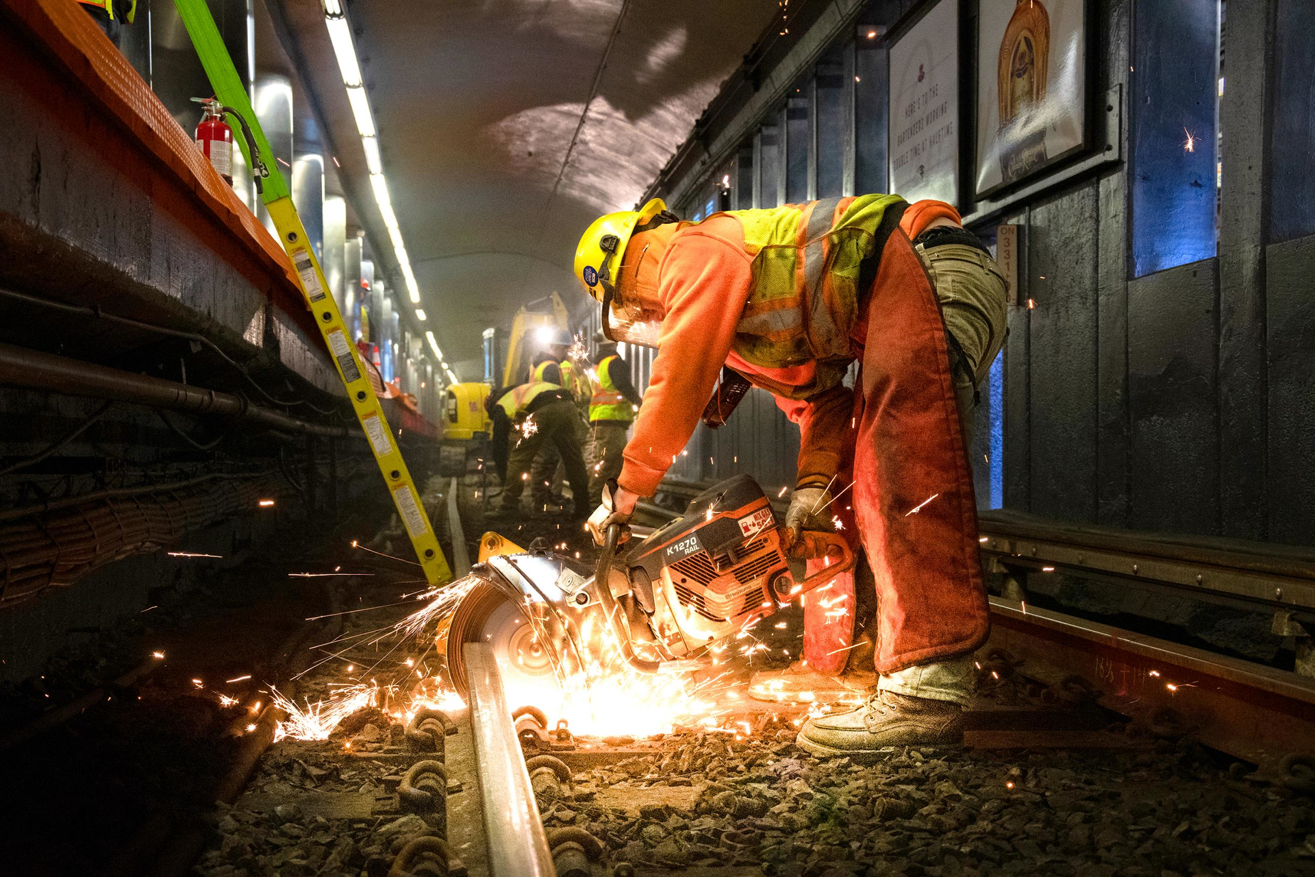 Crews perform track work at Haymarket Station.