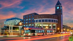 A Zum bus travels in front of Brampton's City Hall. A Zum bus travels in front of Brampton's City Hall.