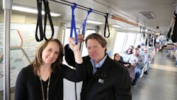 BART Chief Communications Officer Alicia Trost and General Manager Bob Powers demonstrate a prototype personal handstrap. BART Chief Communications Officer Alicia Trost and General Manager Bob Powers demonstrate a prototype personal handstrap.