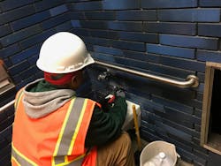 A BART crew member works on the demolition of the restroom at the 19th Street Station. A BART crew member works on the demolition of the restroom at the 19th Street Station.