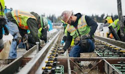Crews install the rail at the Northgate Station. Crews install the rail at the Northgate Station.