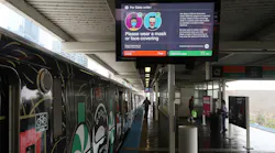 A CTA public service notification about wearing face coverings is displayed at the Roosevelt station, May 14, 2020.