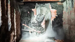 The boring machine broke through the concrete wall near the 1.4-million-square-foot West Hall convention center expansion.