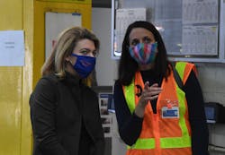 Interim President of NYC Transit Sarah Feinberg and Senior Vice President of Subways Sally Librera watch a demonstration of UV disinfecting technology at the Corona Maintenance Facility on May 19, 2020.