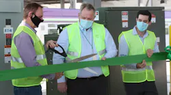 Officials cut the official ribbon celebrating the activation of the solar panels.