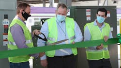 Officials cut the official ribbon celebrating the activation of the solar panels. Officials cut the official ribbon celebrating the activation of the solar panels.