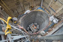 During construction, a cement casing was built down approximately 200 feet after excavation. During construction, a cement casing was built down approximately 200 feet after excavation.