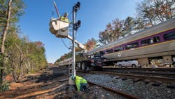 Crews work on an MBTA signal in November 2019. Crews work on an MBTA signal in November 2019.