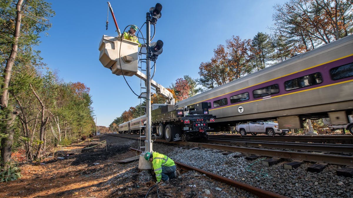 Crews work on an MBTA signal in November 2019.