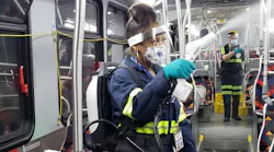 Denver RTD team members disinfect a bus using the EvaClean Protexus Backpack.