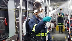 Denver RTD team members disinfect a bus using the EvaClean Protexus Backpack. Denver RTD team members disinfect a bus using the EvaClean Protexus Backpack.