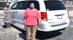 Sandra Spouse (left) and Priscilla Benadom (right) of the Trona Community Senior Center with a donated 2020 transit van.