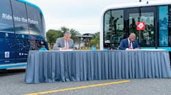 Left, FSCJ President Dr. John Avendano and JTA CEO Nathaniel P. Ford, Sr., sign an MOU that will expand JTA&rsquo;s autonomous vehicle Test &amp; Learn program on FSCJ&rsquo;s Cecil Center Campus.