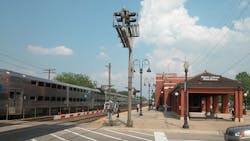 A Metra train at the Downers Grove Main Street station. A Metra train at the Downers Grove Main Street station.