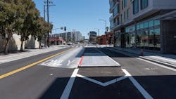 A new center-running transit lane with a boarding island on 16th Street. A new center-running transit lane with a boarding island on 16th Street.