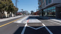 A new center-running transit lane with a boarding island on 16th Street.
