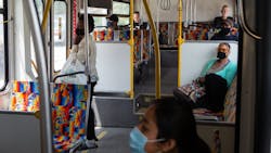 LOS ANGELES, CA - APRIL 29: Pedestrians wearing PPE ride the Westbound 33 Bus towards Venice in downtown Los Angeles on Wednesday, April 29, 2020 in Los Angeles, CA. For thousands of Metropolitan Transportation Authority bus drivers, going to work during a pandemic means spending hours in a confined space with strangers, wondering whether this will be the day they get sick. Ridership on Los Angeles County buses has fallen 65% since the pandemic started. LOS ANGELES, CA - APRIL 29: Pedestrians wearing PPE ride the Westbound 33 Bus towards Venice in downtown Los Angeles on Wednesday, April 29, 2020 in Los Angeles, CA. For thousands of Metropolitan Transportation Authority bus drivers, going to work during a pandemic means spending hours in a confined space with strangers, wondering whether this will be the day they get sick. Ridership on Los Angeles County buses has fallen 65% since the pandemic started.