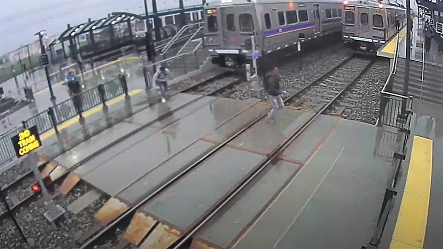 A screenshot of a near miss video compilation from the Regional Transportation District of Denver.