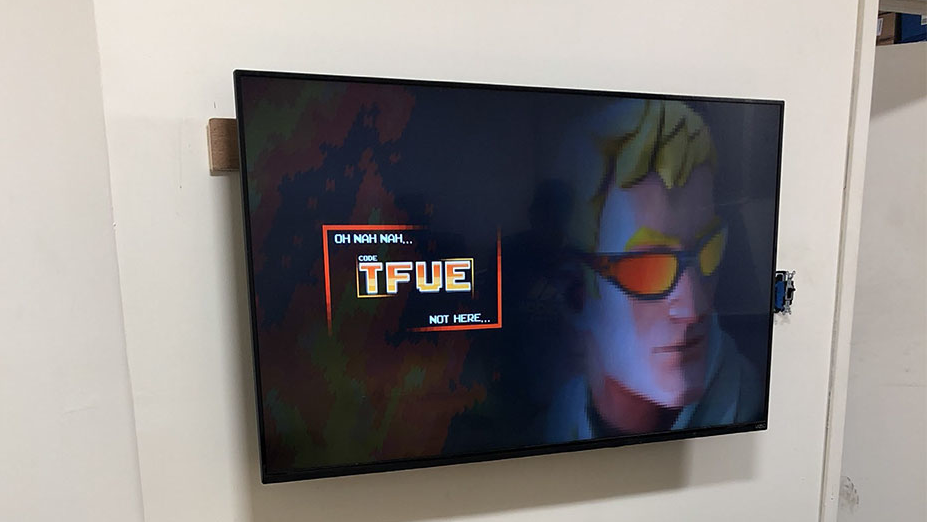 A wall-mounted flat screen television discovered in an unsanctioned break room under a Grand Central Terminal platform.