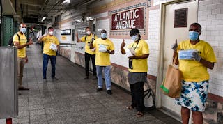 MTA&apos;s &apos;Mask Force&apos; distributing disposable masks to riders in July.