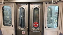 A few of several windows that have been damaged by vandalism on New York City Transit's 7 line. A few of several windows that have been damaged by vandalism on New York City Transit's 7 line.