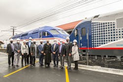 Officials celebrate the beginning of station improvements at the Homewood Amtrak and Metra station.
