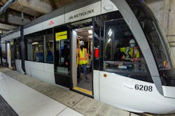 Crews sit in the parked light rail vehicle at Keelesdale Station as part of recent testing. Crews sit in the parked light rail vehicle at Keelesdale Station as part of recent testing.