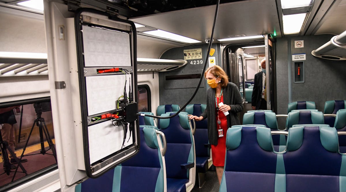 Metro-North Railroad President Catherine Rinaldi and Chief Mechanical Officer Jim Heimbuecher unveil pilot railcar air purification technology.