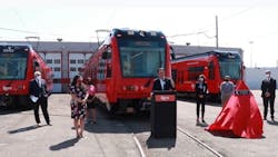 MTS Board Chair Nathan Fletcher, flanked by San Diego transportation leaders and California Transportation Commission Chair Hilary Norton (right of podium) delivers remarks at dedication ceremony for the final trolley car. MTS Board Chair Nathan Fletcher, flanked by San Diego transportation leaders and California Transportation Commission Chair Hilary Norton (right of podium) delivers remarks at dedication ceremony for the final trolley car.