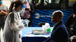 TWU Local 100 Secretary-Treasurer Earl Phillips gets tested for COVID-19 at the Grand Avenue Depot on Tue., October 27, 2020, as part of the launch of voluntary COVID-19 screening program for MTA employees at field locations.