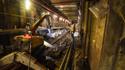 Contractors performing work on the Archer Avenue E line at Sutphin Blvd-Archer Av-JFK Airport station.
