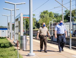 Officers from the St. Louis Metropolitan Police Dept. and St. Louis County Police Dept. in September working together to enhance safety of Metro St. Louis riders.