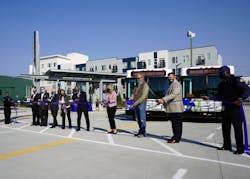 Local officials celebrate the opening of the new transit center. Local officials celebrate the opening of the new transit center.