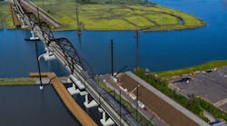 A rendering of the new Portal Bridge, which will sit far enough above the river to allow marine traffic to pass under without disruption to train service.