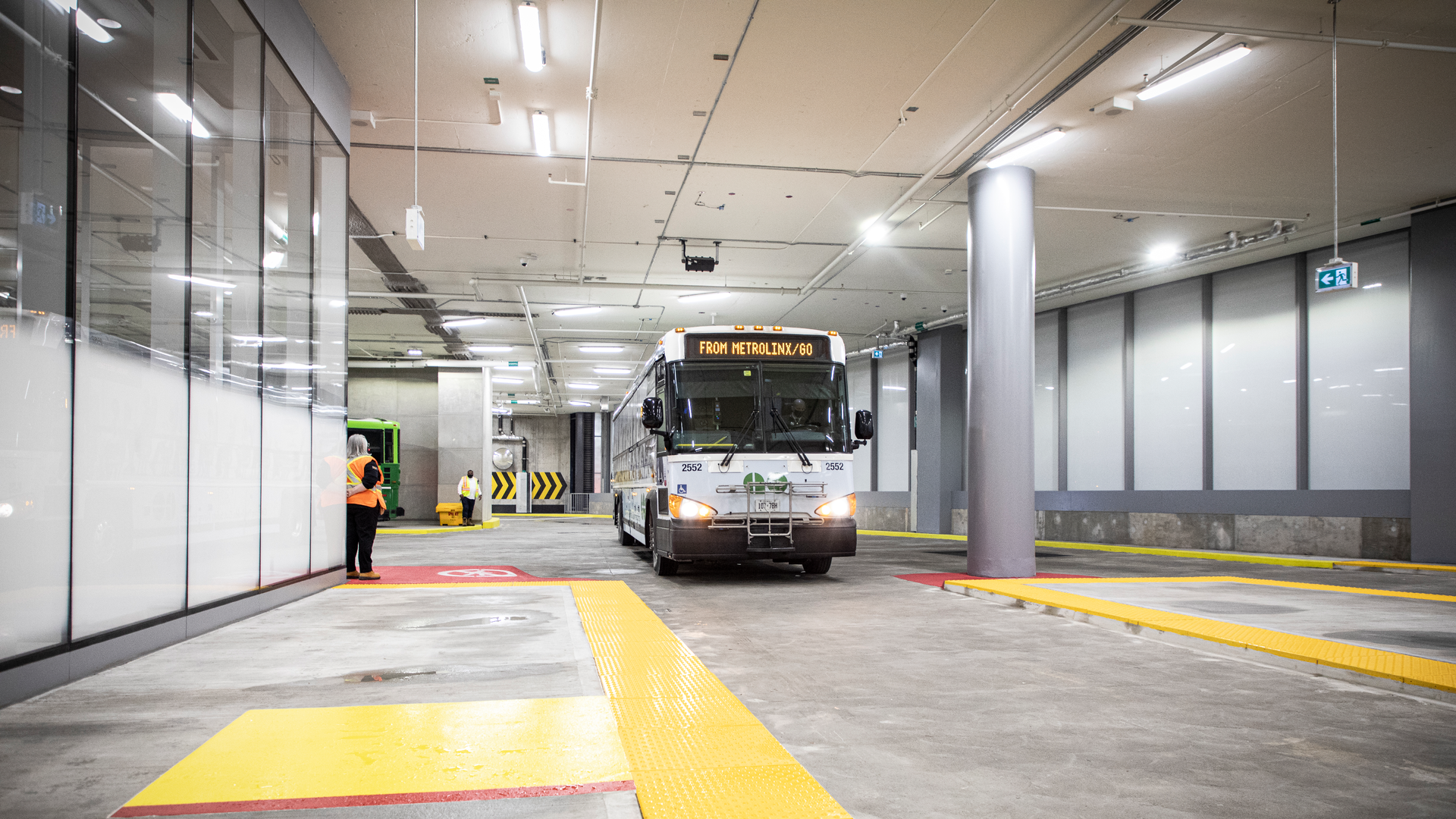 A GO bus arrives inside the facility.