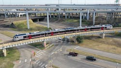 A TEXRail train on the Fort Worth bridge.