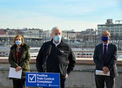 MTA Chairman Pat Foye speaks at an event on Dec. 23 marking Metro-North and LIRR completing implementation of PTC with Metro-North President Catherine Rinaldi, left, and LIRR President Phil Eng, right.