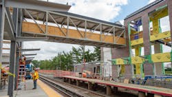 Carle Place pedestrian bridge being installed. Carle Place pedestrian bridge being installed.