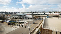 A light- rail test train sits on the tracks at the Northgate Station platform. A light- rail test train sits on the tracks at the Northgate Station platform.