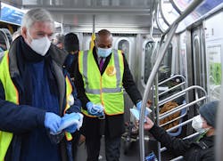 MTA Chairman & CEO Patrick J. Foye, Chief Operating Officer Mario Péloquin, and Queens Borough President Donovan Richards participate in Mask Force aboard an E train. MTA Chairman & CEO Patrick J. Foye, Chief Operating Officer Mario Péloquin, and Queens Borough President Donovan Richards participate in Mask Force aboard an E train.