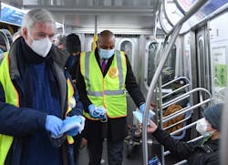 MTA Chairman &amp; CEO Patrick J. Foye, Chief Operating Officer Mario P&eacute;loquin, and Queens Borough President Donovan Richards participate in Mask Force aboard an E train.