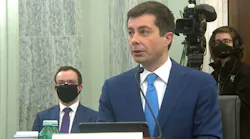 Secretary Buttigieg testifies in front of a Senate Committee Jan. 21 with his husband, Chasten, seated behind him. The secretary noted the importance of this moment as the first openly gay Cabinet member in history.