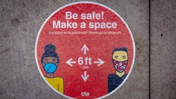 A decal from the Chicago Transit Authority reminding riders to give each other space. A decal from the Chicago Transit Authority reminding riders to give each other space.