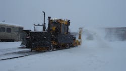 A Nordco M7 Snowfighter, doing what its name claims, clearing snow in Montreal. A Nordco M7 Snowfighter, doing what its name claims, clearing snow in Montreal.